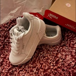 Brand new toddler size 10.5 Puma sneakers.